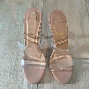 Nude clear strap red bottom heels